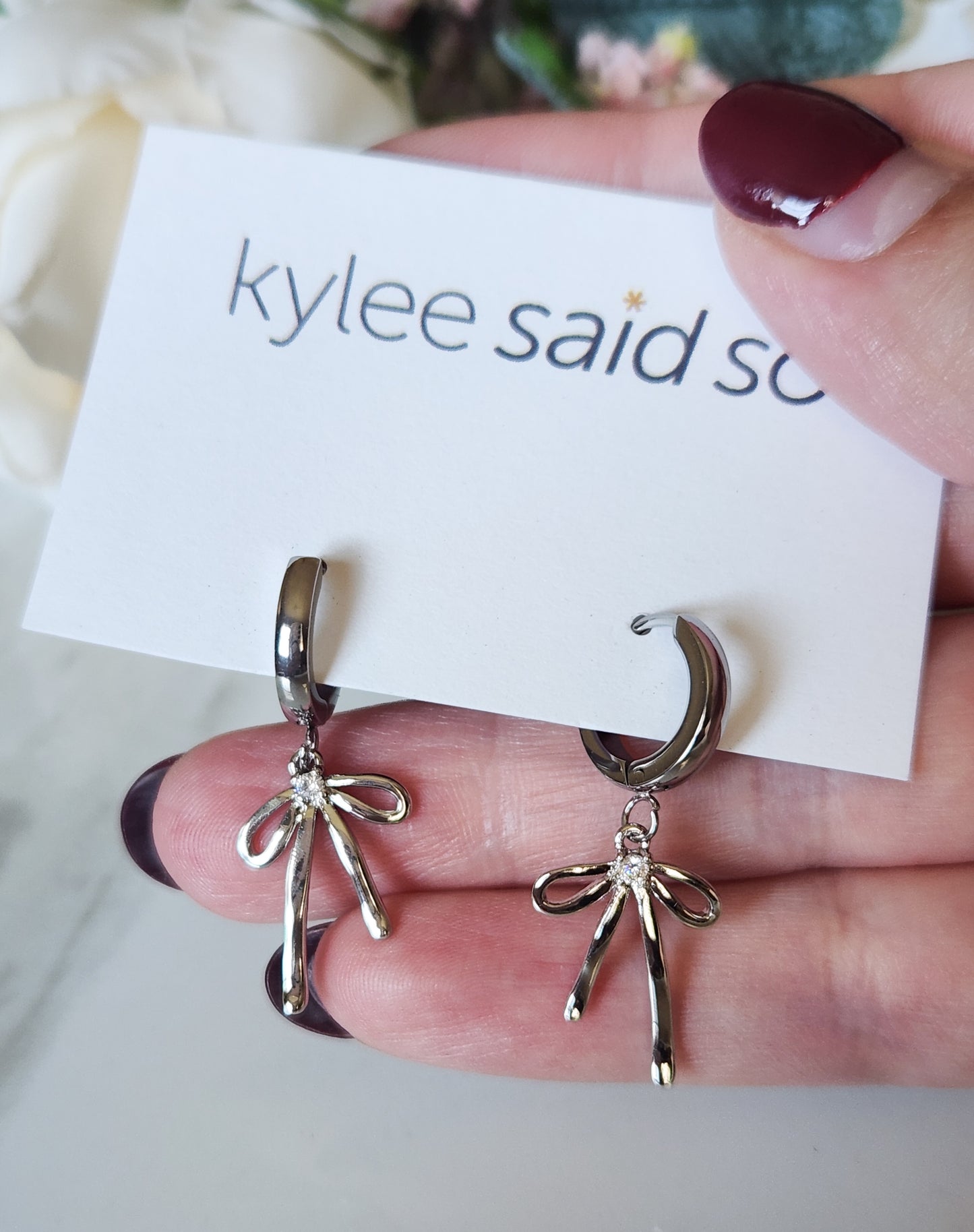Silver Bow Dangle Earrings
